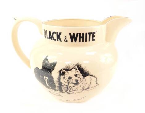 A pottery Black and White advertising water jug, decorated with terriers 'It's the Scotch' and a verse 'A Real Treat', 25cm H.