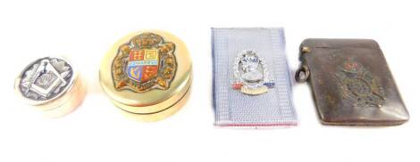 A Masonic silver pill box, of circular form, embossed to the lid with a set square and compass, reserve F & U, together with an Edward VIII brass and enamel commemorative pill box, gun metal and enamel vesta case commemorating the Society of Miniature Rif