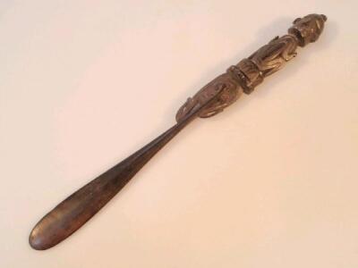 Tribal Art. A late 19thC/early 20thC hardwood lime spatula possibly from Papua New Guinea