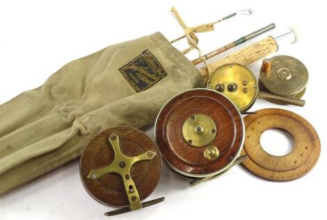 A collection of fishing tackle, to include James Aspindale rod, mahogany and brass reel, hardwood and brass salmon type reel, brass reel etc.