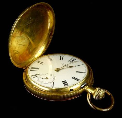 An A.W.Co Waltham hunter pocket watch, with white enamel dial and seconds dial, with movement marked 3943453, in yellow metal case, marked 18C, bezel wind, 112.4g all in.