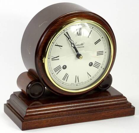 A modern mahogany mantel clock by Comitti of London, on a rectangular base, 21cm W.