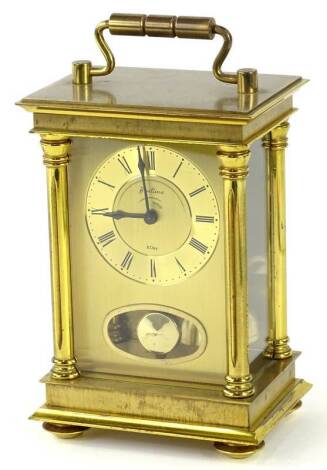 A Bentina brass carriage clock, with gilt dial, decorated with Roman Numerals, aperture for pendulum etc., 19cm H.