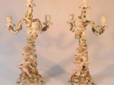 A pair of Sitzendorf porcelain four-light candelabra