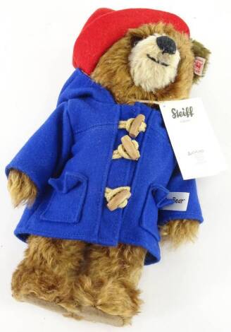 A Steiff Paddington bear, with original label, gold button etc.