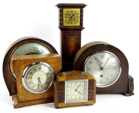 A collection of mantel clocks and timepieces, to include a miniature oak long cased clock, 31cm H, etc. (5) Provenance: This timepiece formed part of Luke Jerram's installation Harrison's Garden, at The Ropewalk Gallery, Barton Upon Humber 2019.