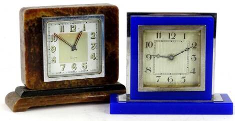 Two Art Deco mantel timepieces, one in chrome plated and blue glass case, the other similar in a marble case. Provenance: This timepiece formed part of Luke Jerram's installation Harrison's Garden, at The Ropewalk Gallery, Barton Upon Humber 2019.