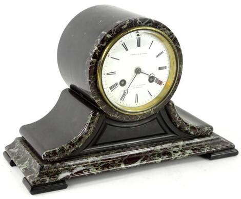 A French black slate and marble mantel clock, the part cylindrical inset with a white enamel dial stamped Fabrique de Paris, Wilson and Gandar 592 Strand, 21cm H. Provenance: This timepiece formed part of Luke Jerram's installation Harrison's Garden, at