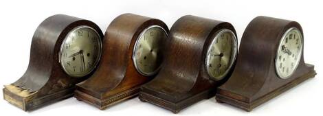 Four oak cased napoleons hat mantel clocks, to include one with Westminster chime. (AF) Provenance: This timepiece formed part of Luke Jerram's installation Harrison's Garden, at The Ropewalk Gallery, Barton Upon Humber 2019