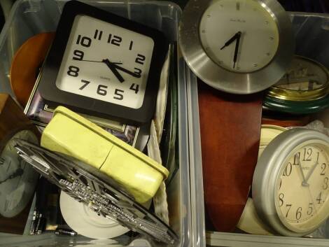 A quantity of mainly quartz wall clocks, various makers and materials used. (2 boxes) Provenance: This timepiece formed part of Luke Jerram's installation Harrison's Garden, at The Ropewalk Gallery, Barton Upon Humber 2019