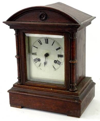 A late 19thC German oak cased mantel clock, the pointed dial with Roman numerals, 34cm H. Provenance: This timepiece formed part of Luke Jerram's installation Harrison's Garden, at The Ropewalk Gallery, Barton Upon Humber 2019.