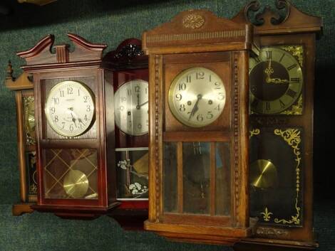 Five various wall clocks, to include two 1920's oak examples with Arabic numerals. Provenance: This timepiece formed part of Luke Jerram's installation Harrison's Garden, at The Ropewalk Gallery, Barton Upon Humber 2019.