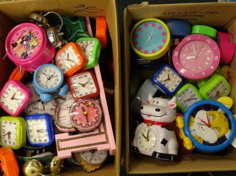 A large quantity of novelty alarm, mantel and wall clocks. (2 boxes) Provenance: This timepiece formed part of Luke Jerram's installation Harrison's Garden, at The Ropewalk Gallery, Barton Upon Humber 2019.