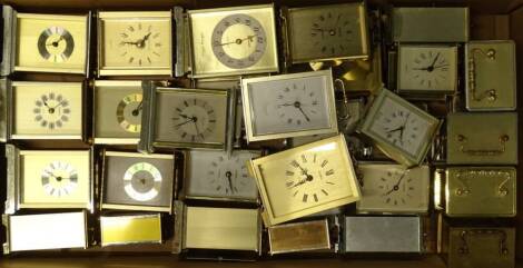 A large quantity of battery operated and brass effect carriage clocks, various makers to include Alpha, Metamec, Estyma, President etc. Provenance: This timepiece formed part of Luke Jerram's installation Harrison's Garden, at The Ropewalk Gallery, Barton