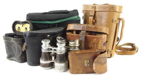 A quantity of binoculars, opera glasses etc., to include a military type pair in leather case.