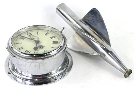 A ship's bulkhead timepiece, in chrome plated case, 20cm dia, and a chrome plated nautical speed indicator.