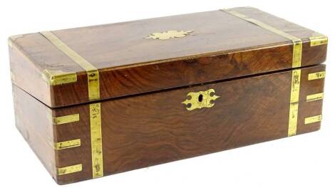 A Victorian walnut and brass writing box, with a vacant cartouche and fitted interior, 50cm W.