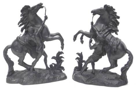 A pair of 19thC Continental spelter Marley horses, each on a naturalistic base, 50cm H.