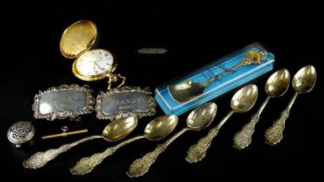 A collection of small silver etc., to include decanter labels, souvenir spoons etc.