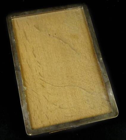 A George V silver and oak rectangular photograph frame, with strutt support, Birmingham 1920, 31cm x 21cm.