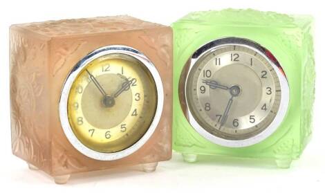 Two similar Art Deco carriage type timepieces, each with a moulded glass case, in the manner of Lalique, 8cm H.