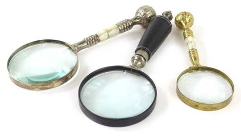 Three decorative magnifying glasses, to include one in silver plate etc.