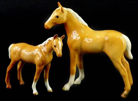 Two Beswick bay foals, the largest 12cm H.