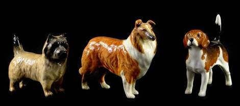 Three Beswick dogs, a beagle, a collie and a terrier.