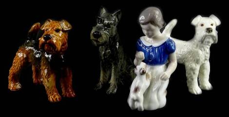 A collection of ceramics, to include three Goebel Terriers, and a Bing & Grondahl figure of a girl with a Terrier. (4)