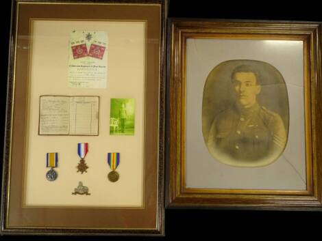 Three First World War medals, associated to a V H Richardson of the Coldstream Guards, framed with a facsimile copy of his Coldstream Guards document, his army record book, to include his service in Lincolnshire Regiment etc., and a black and white photog