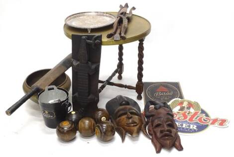 Miscellaneous items, to include an Indian brass tray and stand, an embossed jardiniere, lignum bowls, cricket bat, brewery and spirit related advertising pieces, tribal mask etc.