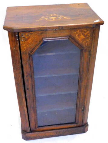 A Victorian walnut and marquetry music cabinet, the glazed door enclosing various named shelves on plinth base, 51cm W.