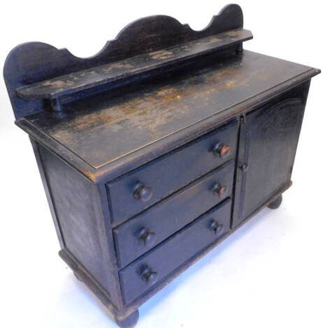 A late 19thC Lincolnshire painted pine dresser, with a raised back above an arrangement of three drawers and a panelled door on turned legs, 121cm W. (AF)