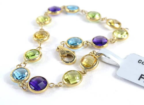 A Coloured Rocks bracelet, with an arrangement of blue, purple, yellow, orange and green stones, yellow metal marked 14K, 17cm long, boxed.