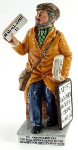 A Royal Doulton porcelain figure The News Vendor, HN2891, 22cm H.