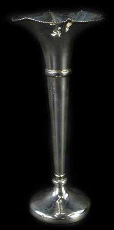 A George V silver bud vase, of tapering form, with loaded base, Birmingham 1924, 5¾oz overall, 20cm H.