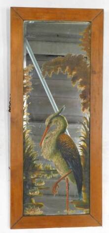 A Victorian aesthetic movement mirror painting, decorated with a heron beside lilies etc., later framed, 90cm x 32cm.