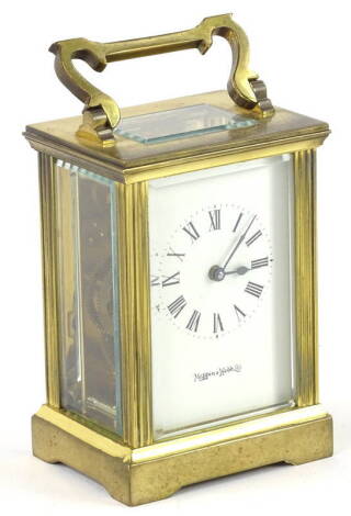 A Mappin & Webb brass carriage timepiece, with hinged handle, 15cm H overall.