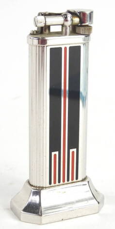 A Dunhill cigarette lighter, with Art Deco style enamel decoration in black and red, stamped 28322.