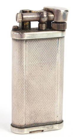 A Dunhill cigarette silver plated cigarette lighter, with engine turned decoration, stamped W F 475768.