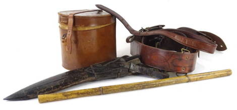 Miscellaneous leather ware, etc., to include a First World War Sam Brown belt, a horseshoe shaped collar box, a kukri with two smaller knives in leather scabbard, etc.