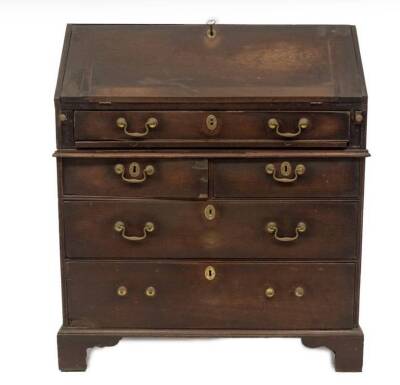 A George II mahogany bureau, with fall flap resting on lopers, revealing a fitted interior, over single drawer to the top, and three further graduated drawers to the base with brass swan neck handles and oval escutcheons, on bracket feet, 115cm H, 100cm W