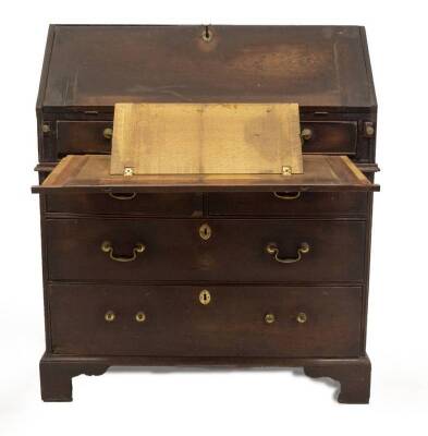 A George II mahogany bureau, with fall flap resting on lopers, revealing a fitted interior, over single drawer to the top, and three further graduated drawers to the base with brass swan neck handles and oval escutcheons, on bracket feet, 115cm H, 100cm W - 3