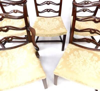 A set of five George III mahogany dining chairs in the Chippendale manner, including carver, having scroll terminal cresting rails, pierced and carved ladderbacks, moulded concave shoe piece, overstuffed concave seat, moulded and chamferred square foreleg - 3