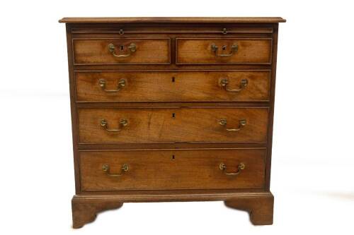 A George III mahogany chest, of two short and three long graduated drawers, with oak linings, brass swan neck handles and bracket feet, 85cm H, 85cm W, 45cm D.