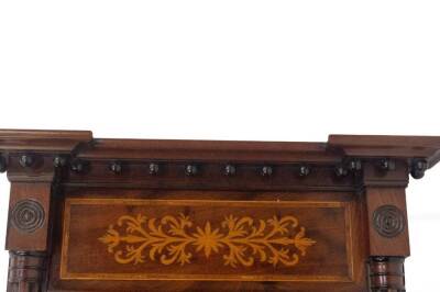 A Regency mahogany pier glass by Hobster of Boston, having an inverted breakfront and ball decorated pediment, satin wood marquetry arabesque panel with rosewood crossbanding, roundel and reeded decoration and cluster columns with ebonised rings, 82cm x 5 - 2