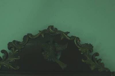 A 19thC parcel gilt pier glass in the Chippendale manner, having parcel foliate scroll and shell applied frame, with ho-ho bird to the pediment, and rectangular mirror plate, 145cm x 84cm. - 2