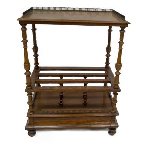 A Victorian figured walnut whatnot Canterbury, with brass galleried top, turned uprights and three section base with gallery and moulded bottom drawer and turned legs, 80cm H, 60cm W, 38cm D.