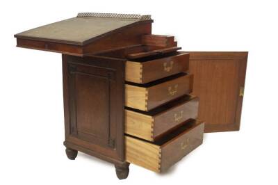 A Regency teak Davenport in the manner of Gillows, with pierced brass gallery, tooled leather slope, revealing a fitted interior having ivory handled drawers, swivel draw front, slides to each side and panelled door revealing four drawers with brass campa - 2