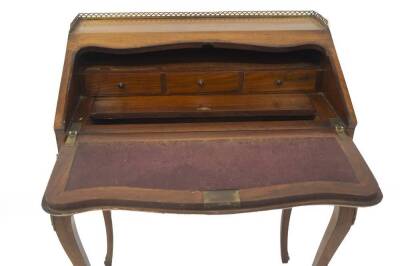 A 19thC rosewood marquetry bureau de dame, with galleried top and fall flap having a floral marquetry panel in satinwood and harewood, revealing a three drawer interior with well, shaped apron on square cabriole legs with gilt metal mounts, 92cm H, 74cm W - 2
